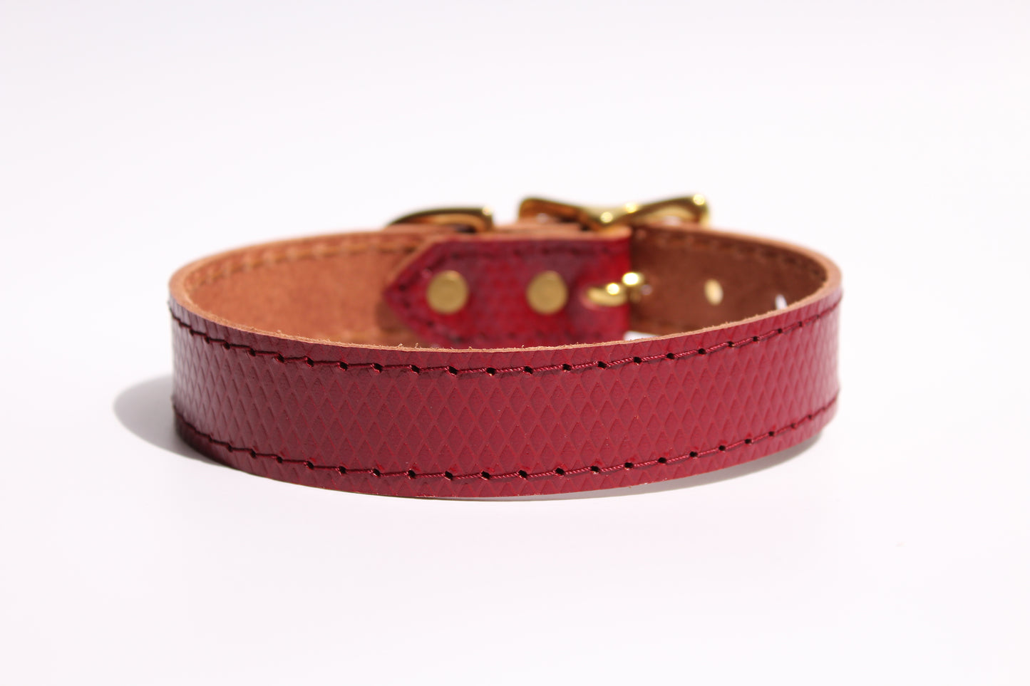 Back view of luxury red leather dog collar, showcasing the smooth, high-quality leather and elegant craftsmanship.